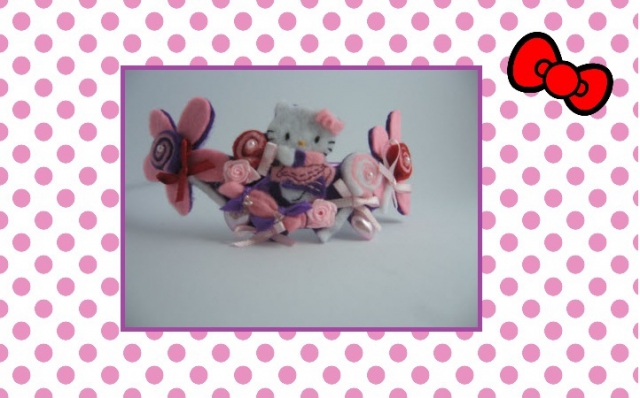 Cerchietto Hello Kitty con caramelle